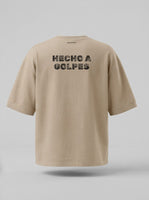 Espalda: Hecho a golpes