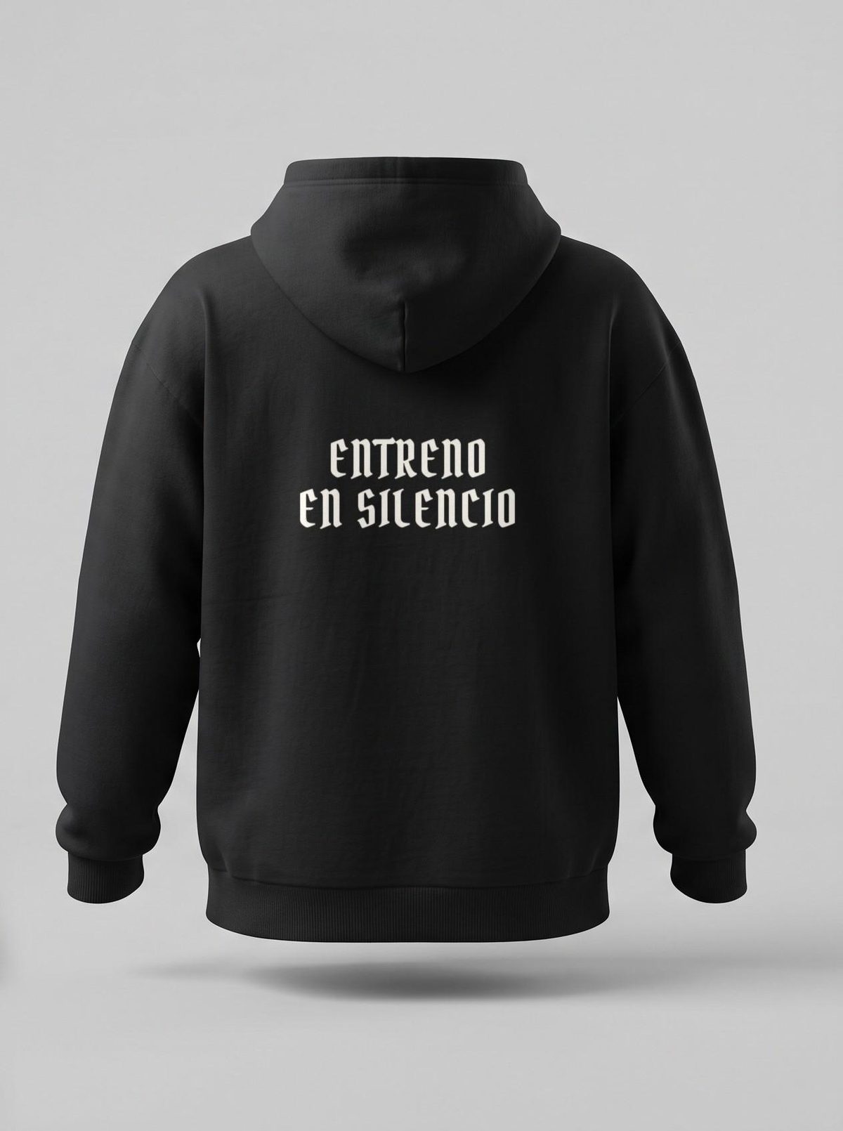 Sudadera oversize negra, espalda: Entreno en silencio